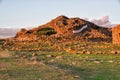 Sardinia. Gonnesa. Archaeological area of Ã¢â¬â¹Ã¢â¬â¹Seruci. October 13, 2020. Banner hanging on a tower of the Nuraghe Seruci