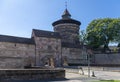 Nuremberg city wall with gate Neutor, tower Neutorturm, bridge and bastion, behind the wall is the old town Royalty Free Stock Photo