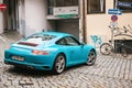 Nuremberg, December 27: blue Porsche car next to the garage of Durer Hotel.