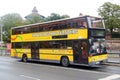 Nuremberg, Germany - August 27, 2023: Hop-On Hop-Off sightseeing bus in the city center. Tours on yellow double deckers are