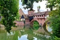 Nuremberg, Germany, old bridge with medieval tower with river reflections Royalty Free Stock Photo