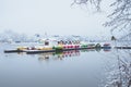 Nuremberg, Germany - February 8, 2021: Deserted boat hire stall at a lake in winter landscape in Nuremberg