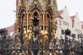 Detail of the Schoner Brunnen fountain and statue in market square of Nuremberg, Germany