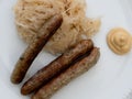 Nuremberg Grilled Sausage or NÃÂ¼rnberger Rostbratwurst with Sauerkraut