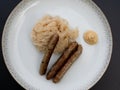 Nuremberg Grilled Sausage or NÃÂ¼rnberger Rostbratwurst with Sauerkraut