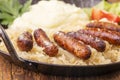 Nuremberg sausages with sauerkraut Royalty Free Stock Photo