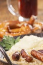 Nuremberg sausages with sauerkraut Royalty Free Stock Photo