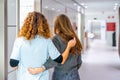 Nurse accompanies a patient to the consultation