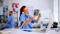 Nurse answering at hospital call checking the result of patient x-ray Royalty Free Stock Photo