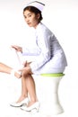 Nurse bandaging patient Royalty Free Stock Photo