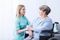 Nurse caring about elder woman Royalty Free Stock Photo