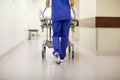 Nurse carrying hospital gurney to emergency room Royalty Free Stock Photo