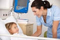 Nurse with child patient in UK A&E Royalty Free Stock Photo