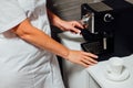 Nurse in cosmetic beauty parlour making coffee Royalty Free Stock Photo