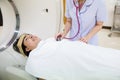 Nurse is counting heart rate. doctor using a stethoscope to listen to man patient`s chest checking heartbeat or lung in medical cl Royalty Free Stock Photo