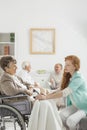 Nurse covering senior lady