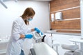 Nurse disinfect dental chair in stomatology clinic