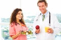 Nurse and Doctor with health food Royalty Free Stock Photo