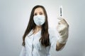 Nurse doctor woman holding test tube with blood for Covid-19 test. Corona Virus Disease 2019 blood analyzing concept Royalty Free Stock Photo