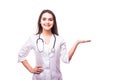 Nurse doctor woman smile with stethoscope, hold hand showing something on the open palm, Royalty Free Stock Photo