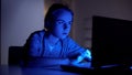 Nurse on duty typing on laptop, hurrying to meet deadline at work, night shift Royalty Free Stock Photo