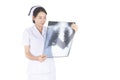 Nurse examine patient data from medical x-ray film