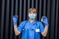 The nurse examines the contents of the medication vial. medical concept