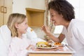 Nurse Feeding Young Girl