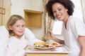 Nurse Feeding Young Girl