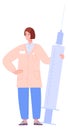 Nurse with giant syringe. Medical shot injection