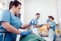 Nurse giving anesthesia to patient waiting for endoscopy