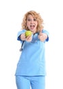 Nurse giving apple and measurement Royalty Free Stock Photo