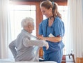 Nurse, healthcare and senior woman in nursing home with physician helping her dress up. Disability, rehabilitation and Royalty Free Stock Photo