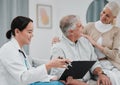 Nurse, healthcare and trust with a senior couple in their home, talking to a medicine professional. Medical, insurance Royalty Free Stock Photo