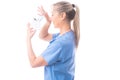 Nurse or healthcare worker putting on a N95 mask