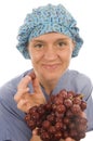 Nurse healthy diet fresh fruit grapes Royalty Free Stock Photo