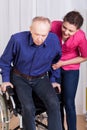 Nurse helping disabled patient Royalty Free Stock Photo