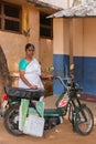 Nurse and her motorbike serving rural communities.