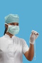 Nurse holding an arterial catheter