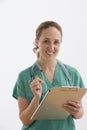 Nurse Holding a Clipboard - Isolated Royalty Free Stock Photo