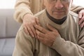 Nurse holding hand of senior man in rest home Royalty Free Stock Photo
