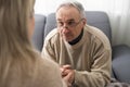 Nurse holding hand of senior man in rest home Royalty Free Stock Photo