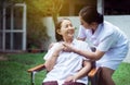 Nurse holding hands to elderly Asian woman with Alzheimer disease,Positive thinking,Happy and smiling,Take care and support concep Royalty Free Stock Photo