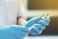 Nurse holding syringe and vaccine for injection Royalty Free Stock Photo