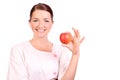 Nurse holding up an apple