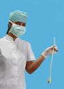 Nurse holding an urinary catheter Royalty Free Stock Photo