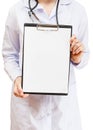 Nurse holds clipboard with blank paper Royalty Free Stock Photo