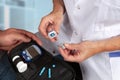 Nurse instructs blood sugar test to a patiÃÂ«nt Royalty Free Stock Photo