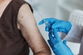 nurse makes an injection in the arm immunity protection covid passport close-up Royalty Free Stock Photo