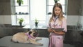The nurse is making notes after cheking up the pug dog Royalty Free Stock Photo